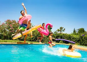 People enjoying a completed swimming pool