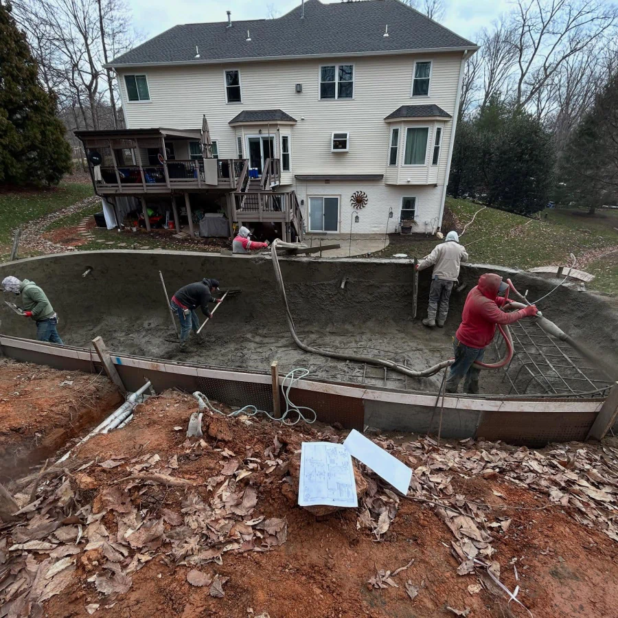team of workers building a pool leesburg va
